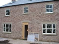 Custom made aluminium/timber sash windows