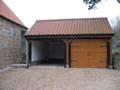 Fresh sawn European oak framework and featheredged boarding