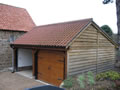 Fresh sawn European oak framework and featheredged boarding